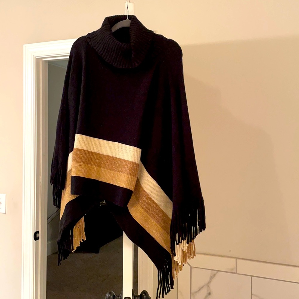 Black, golds, cream poncho